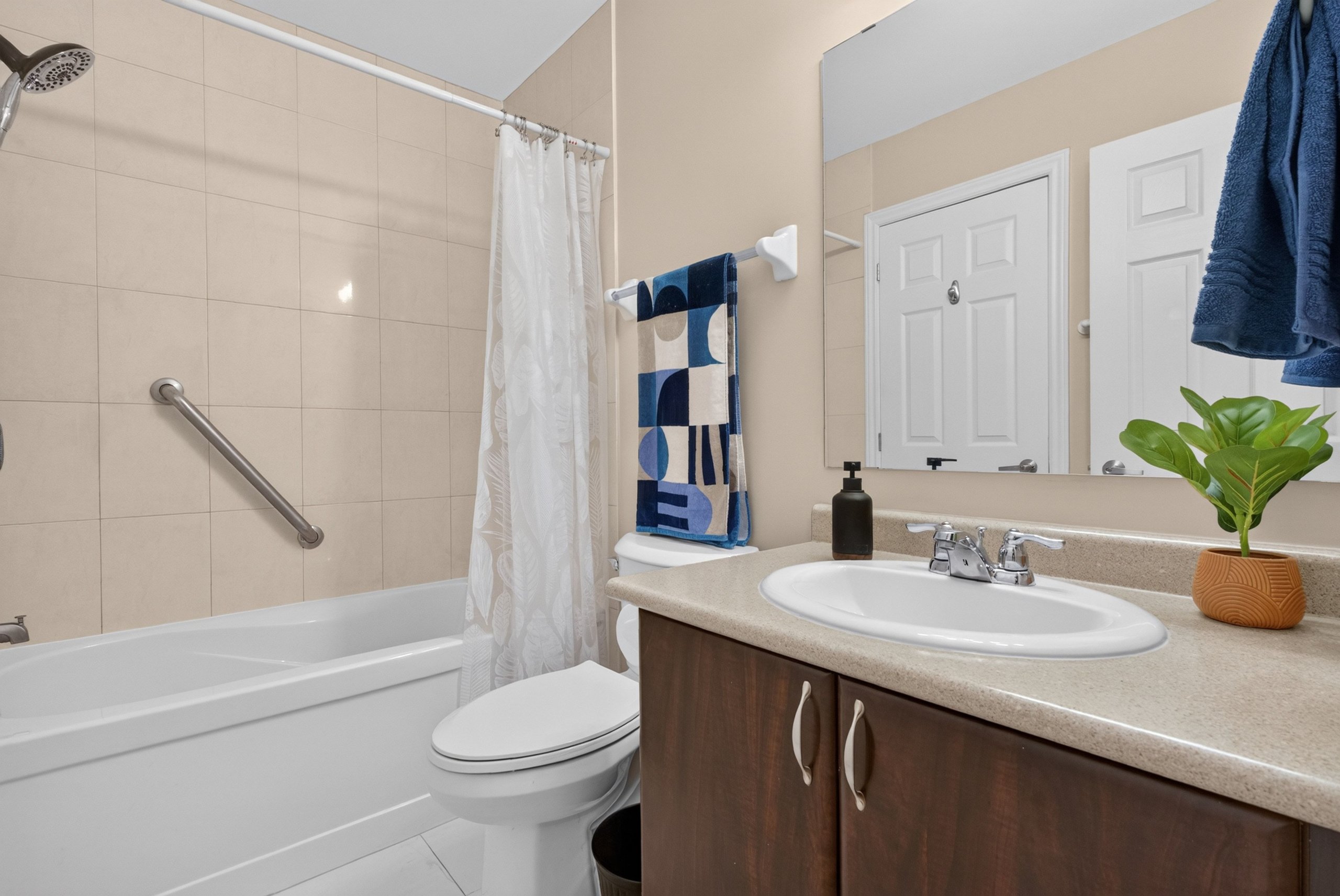 Full bathroom with tub and shower